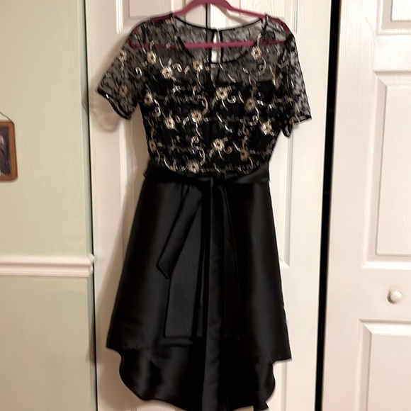 r & k Dresses & Skirts - Black cocktail dress with patterned overlay top. Satin skirt.